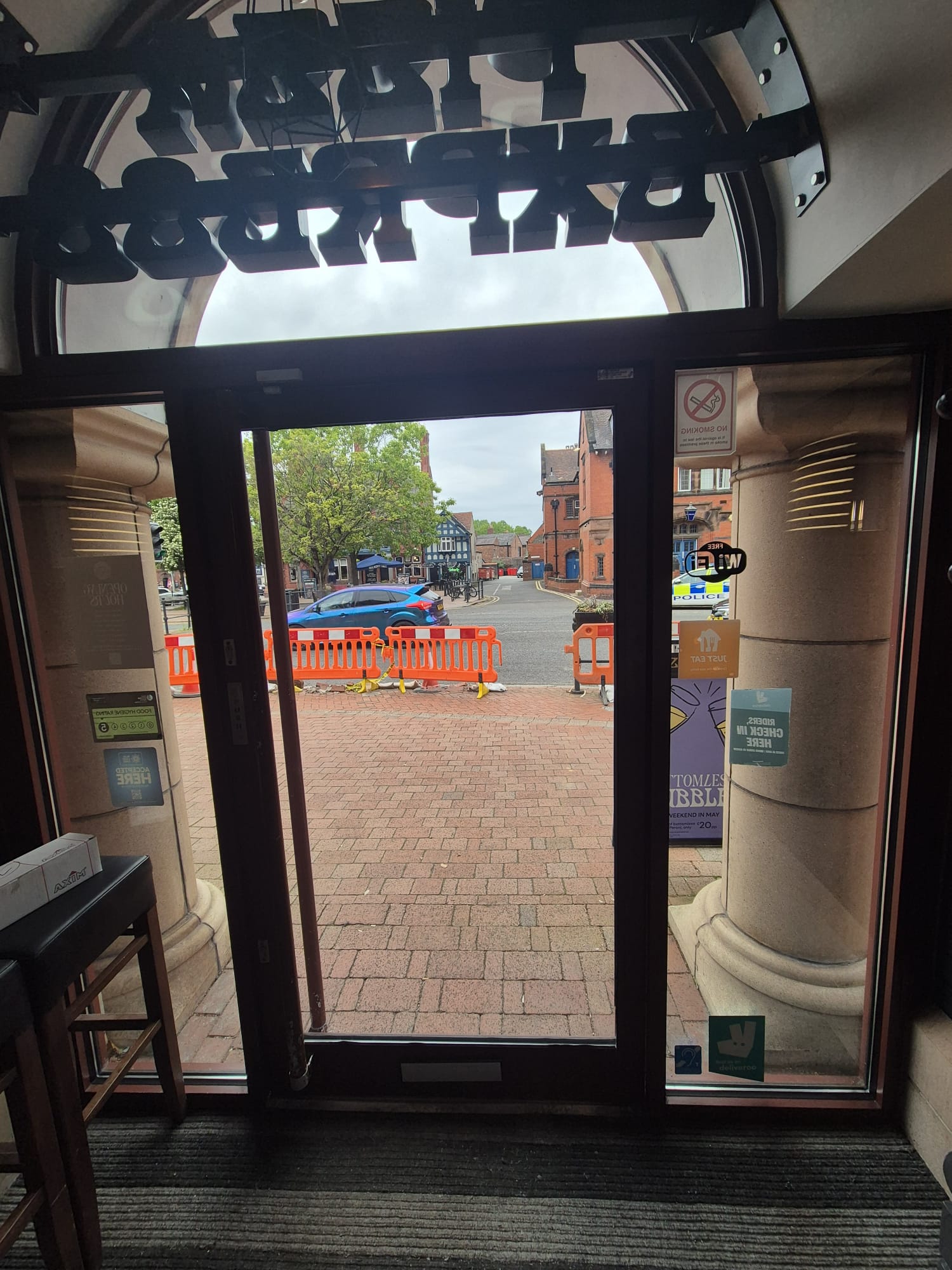 Commercial aluminium door repair at St Helens coffee shop by Tommy